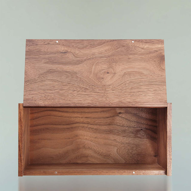 The black walnut Beardbrand Beardsman’s Box shown from the top with the lid opened.