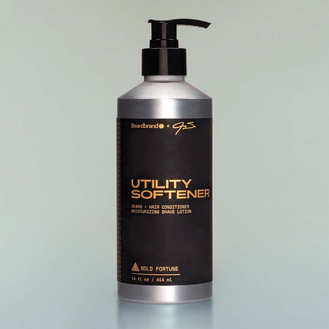 A bottle of Bold Fortune Utility Softener with a pump dispenser against a grey background.